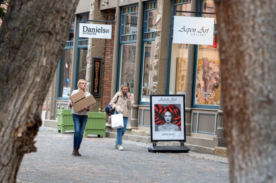 People walk along the Hyman Avenue Pedestrian Mall on Friday. Sales tax in Aspen will reach above 10% beginning next year.