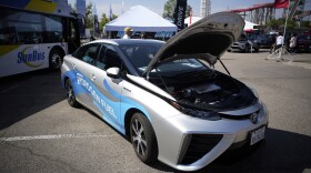 A 2021 Toyota Prius that runs on a hydrogen fuel cell sits on display at the Denver auto show on Sept. 17, 2021, at Elitch's Gardens in downtown Denver. The White House has selected the Philadelphia area and West Virginia for two regional hubs to produce and deliver hydrogen fuel, an important part of the Biden administration's clean energy plan, according to a person familiar with the plan.
