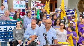Rob Baril, the president of SEIU 1199, in July 2021 arguing that state employees deserve raises. Behind him to the left is Sal Luciano, president of the state AFL-CIO. MARK PAZNIOKAS / CTMIRROR.ORG