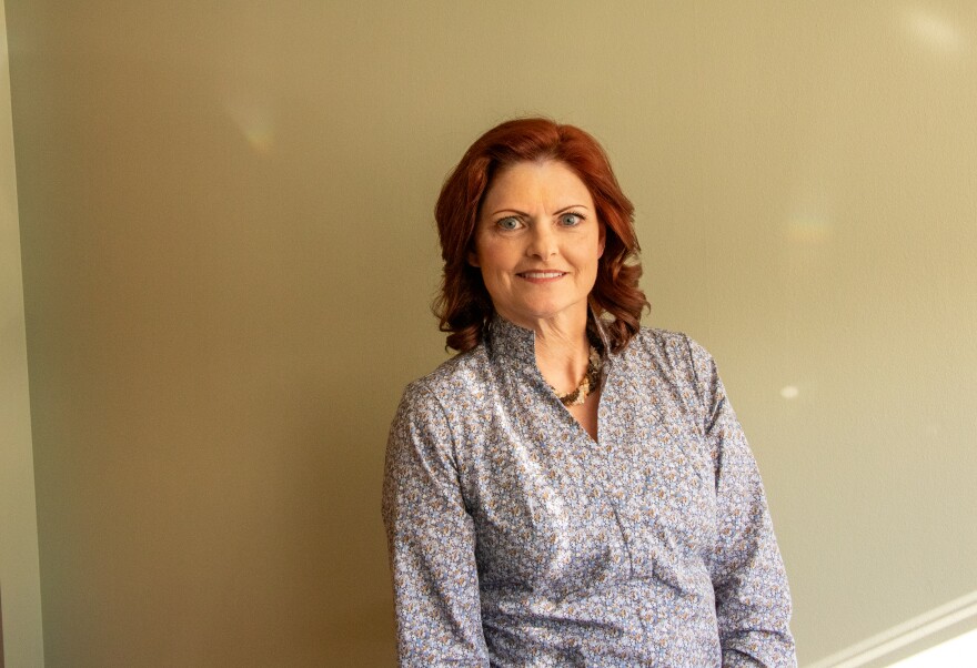 Dr. Mary Clarke, a family physician at Stillwater Medical Center, stands in her office.