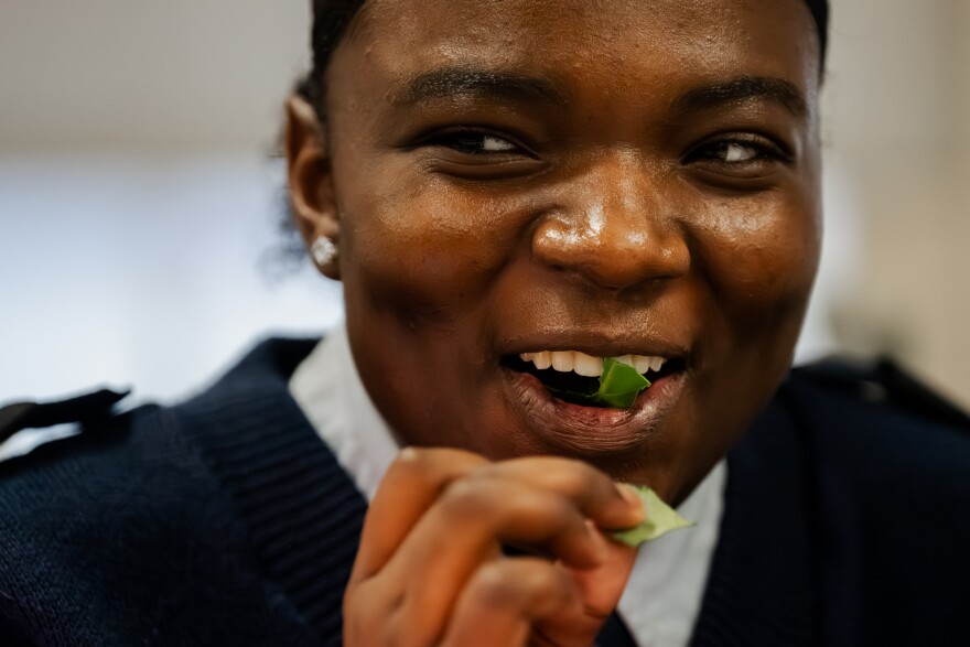 University City High senior Ra’keira Wallace tries a piece of lettuce during an agriculture sciences class at the school on Wednesday, March 4, 2026, in University City.