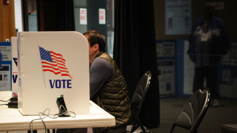 A person votes at the World War I Museum and Memorial on April 8, 2025