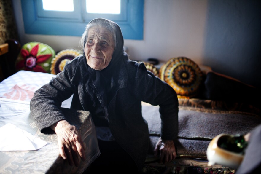 Efstratia Mavrapidou, 89, at her home in the village of Skala Sikaminias, Lesbos. "When my mother arrived here in 1922, there were five impoverished farmers here," she says. "She and her babies slept in sheds where olives were stored."
