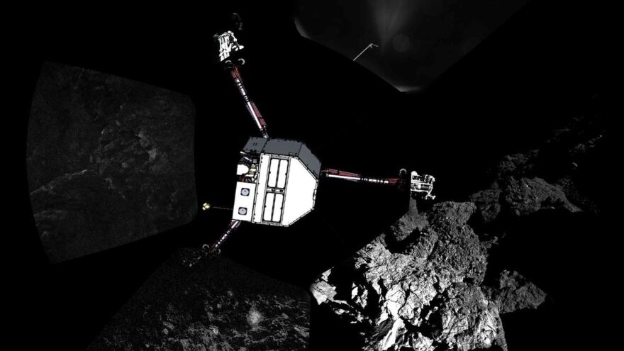 The ESA released this composite panoramic image showing Philae's surroundings on Comet 67P. To illustrate the lander's orientation, the agency super-imposed a sketch of the craft.