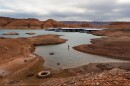 A fisherman tries his luck in the receding waters near Bullfrog Marina at Lake Powell on Friday, Saturday, April 24, 2026.
