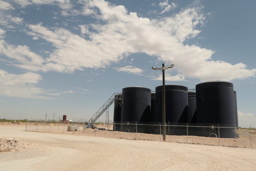 Produced water is stored in tanks outside Pecos, Texas in August 2023. Spills of produced water often occur at storage tanks or from pipelines.