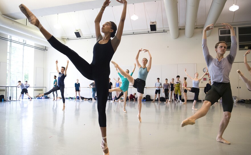 Amanda Morgan, left, dances during company class with instructor Peter Boal on Thursday, May 24, 2018, at the Pacific Northwest Ballet in Seattle.