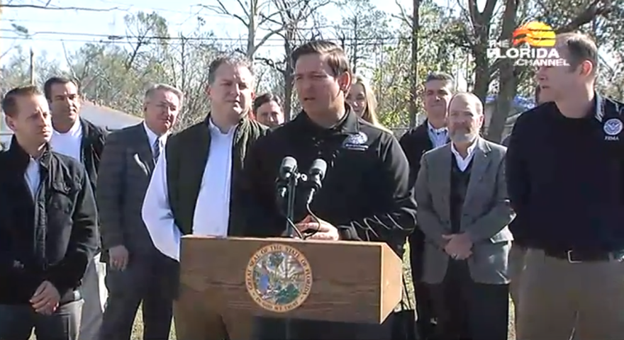 Governor Ron DeSantis addresses reporters in Panama City.