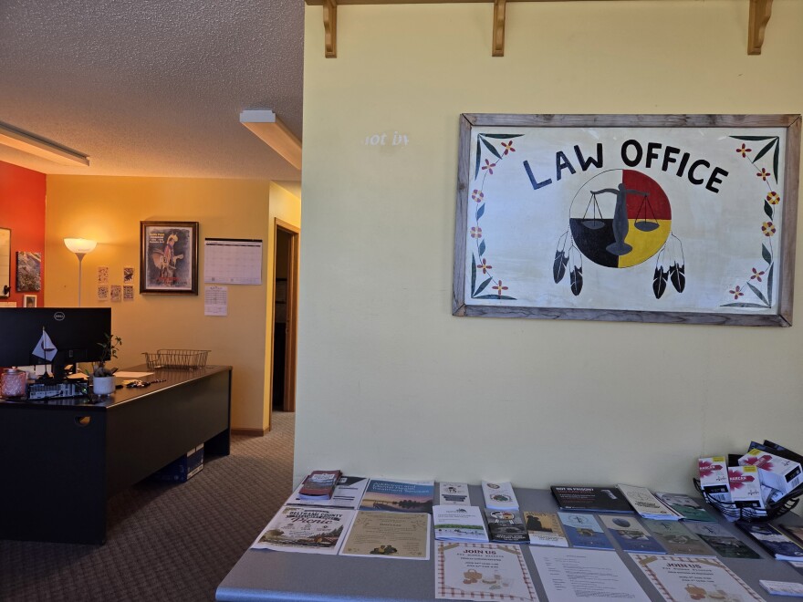 The main entrance to the Regional Native Public Defense Corp.'s downtown Cass Lake office, with a table of brochures highlighting community events in Bemidji, Cass Lake and elsewhere in its service region on June 30, 2026.
