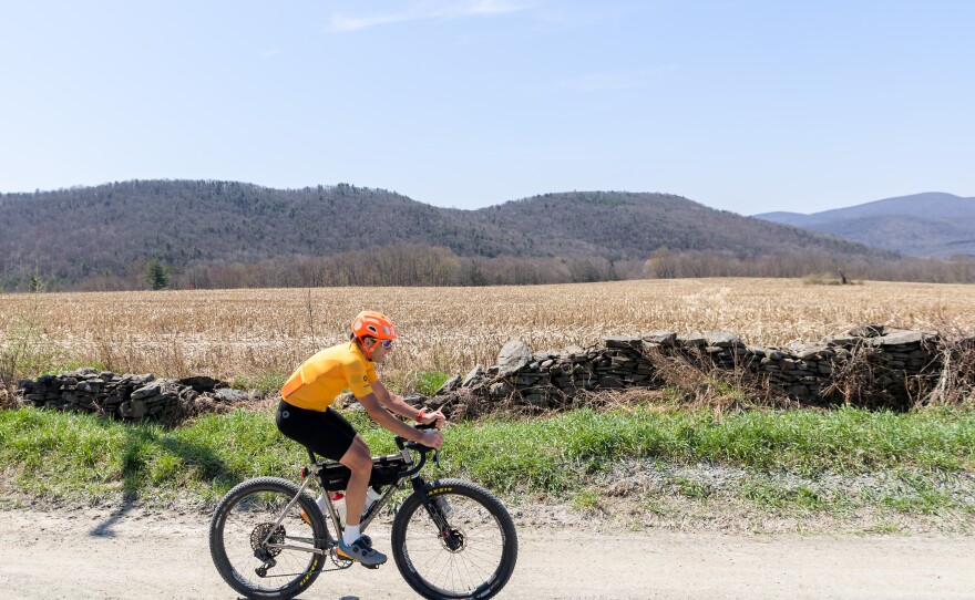A cyclist rides through the region during the 2022 Lu Lacka Wyco Hundo Bike Ride