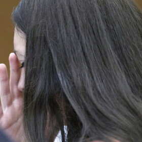 Lindsay Clancy listens to medical testimony from doctors who treated her children during her trial. Clancy, 36, does not deny she killed her three young children, but her attorney argues she should not be held criminally responsible because she was suffering from postpartum psychosis when she strangled them.
