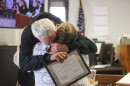 Michael Kincaid hugs Licking County Municipal Court H.O.M.E. Court Program Coordinator and Community Navigator Sherry Selfe after graduating from the court diversion program on Wednesday, Aug. 12, 2026.