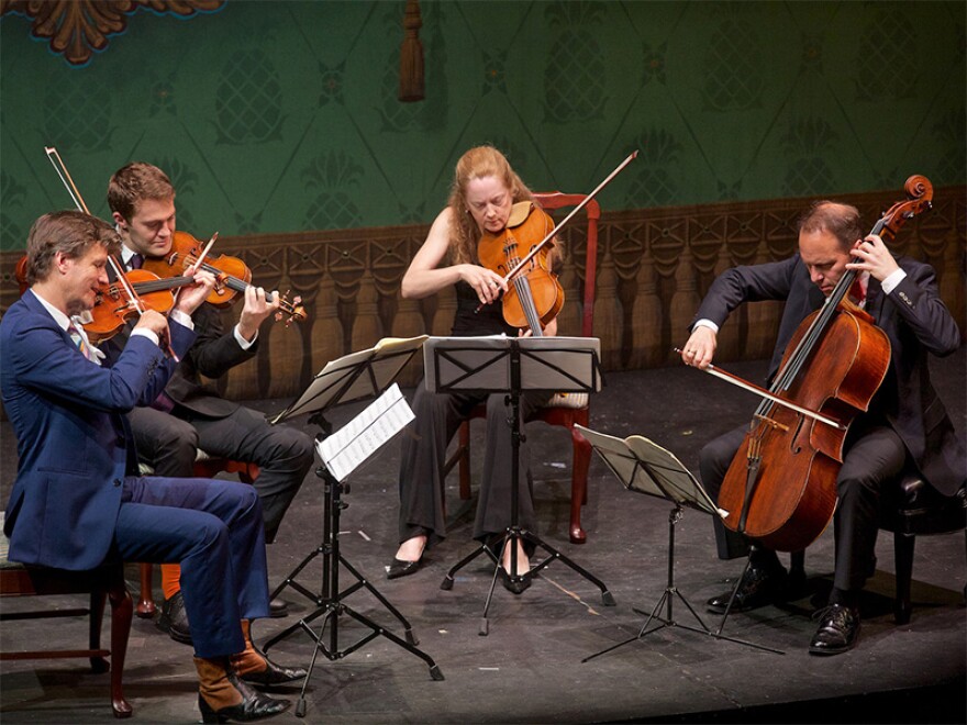 Director and violinist Geoff Nuttall (far left) directs and hosts the Bank of America Chamber Music Series at the Dock Street Theatre, featuring the St. Lawrence String Quartet.