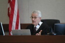 Judge John Pacht is presiding over the trial.