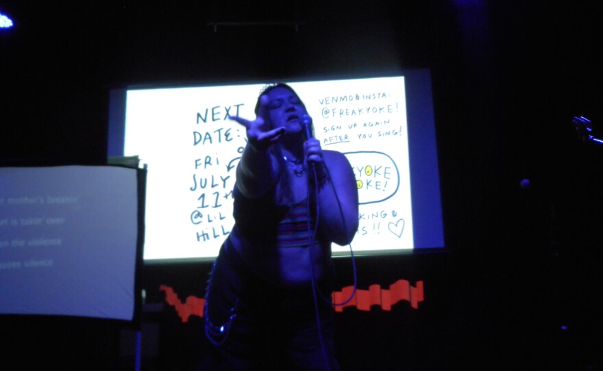 Multidisciplinary artist KOTA XXX sings "Zombie" by the Cranberries during Freakyoke at Thee Stork Club.