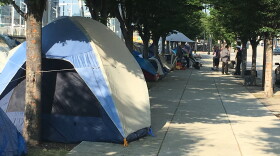 The homeless will be allowed to sleep on Third Street Friday night even though the judge didn't issue a temporary restraining order. 