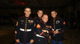 Sgt. Jordan Hunkin (front, center) is seen wearing his uniform with fellow Marines. (Photo courtesy of James Hobby)