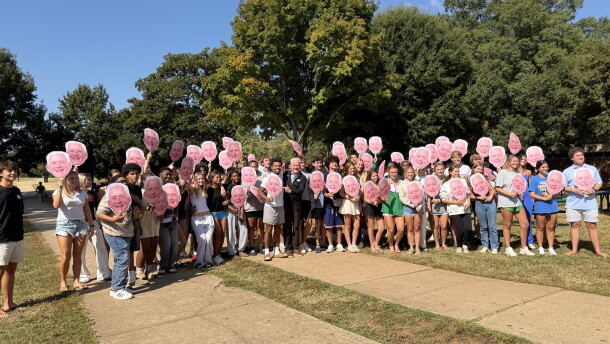 Myers Park students celebrate with Bob Folk, who was named Principal of the Year.
