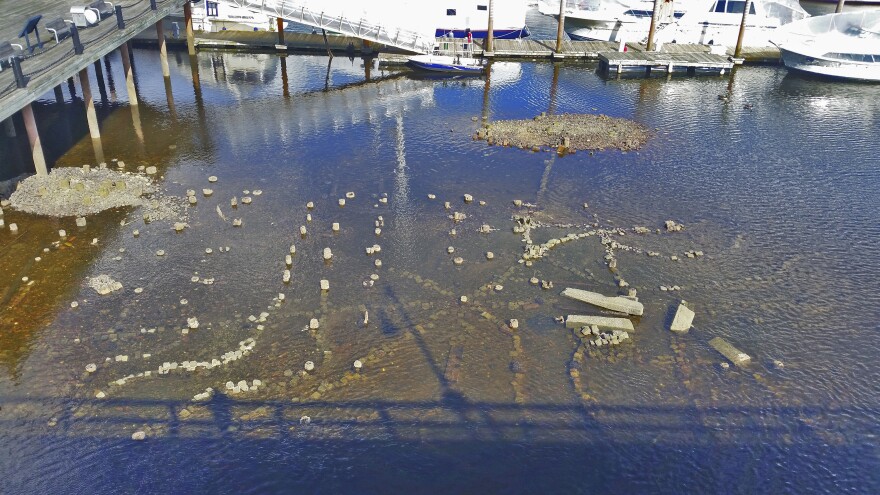 Swain made this miniature city from scraps of Belgian block and brick. It's only visible at low tide. He wants viewers to imagine the effects of sea level change on Boston.