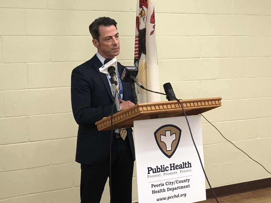 OSF HealthCare Children's Hospital of Illinois president Michael Wells speaks during Thursday's Tri-County health briefing at the Noble Center in Peoria.