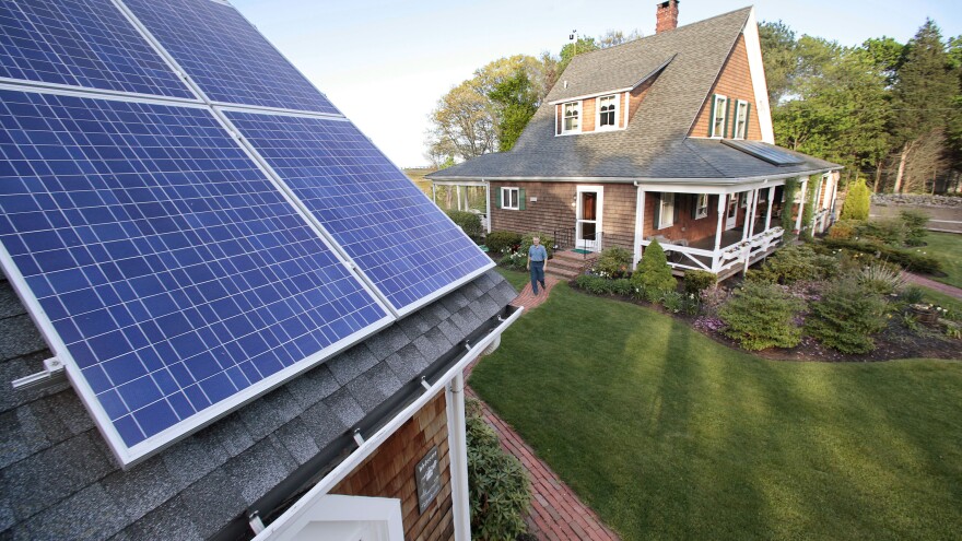 Solar energy panels on a roof in Marshfield, Mass.