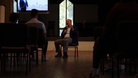 Detroit Mayor Mike Duggan speaking with CMU students in October 2026