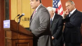 Columbus City Council president Andrew Ginther proposes ethics reforms as Mayor Michael Coleman, Auditor Hugh Dorian listen