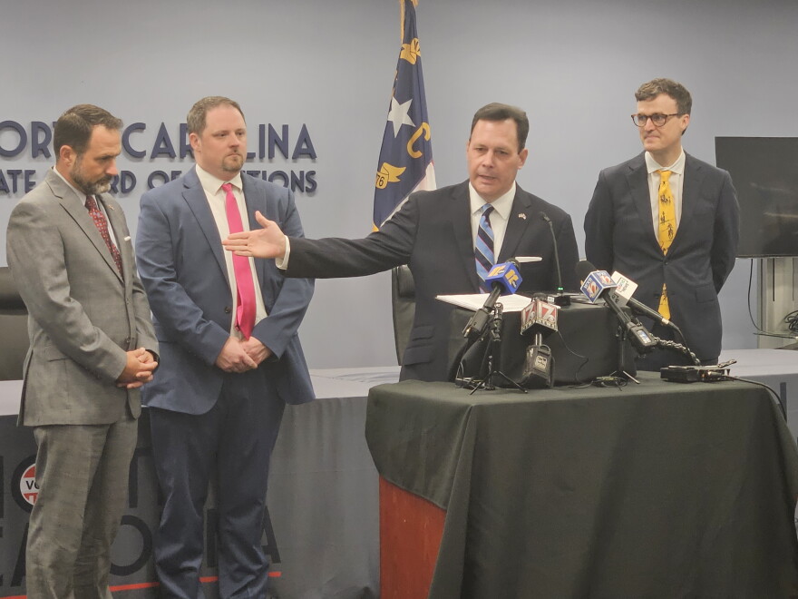 N.C. State Board of Elections executive director Sam Hayes, center, held a news conference Thursday about the start of mail-in absentee voting.