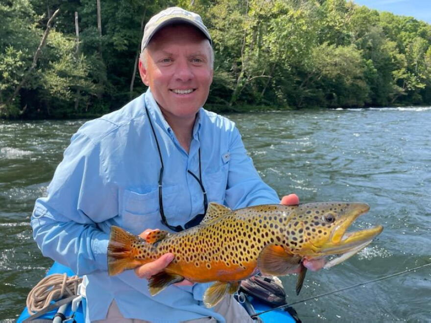Professor Keith Gido holding a beautiful brown trout