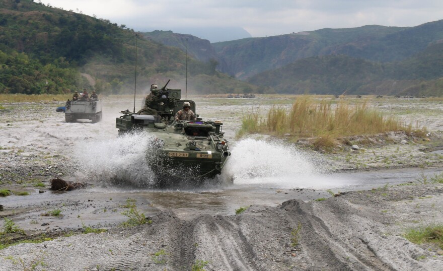 Soldiers of Company A, 2nd Battalion, 3rd Infantry Regiment, conduct driver operations and mounted platoon maneuvers with counterparts from the Armed Forces of the Philippines in Crow Valley, Philippines on April 6, 2016. (U.S. Army photo by Sgt. Deja Borden)