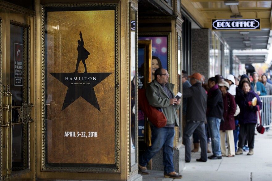 People lined up outside the Fox Thatre last October to buy "Hamilton" tickets.