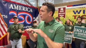 Republican governor nominee Zach Lahn speaks at the Iowa State Fair. (Sheila Brummer, IPR)
