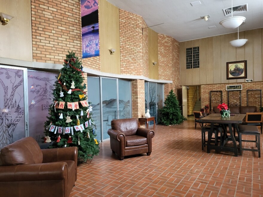 A Christmas tree stands in the lobby of First Congregational Church