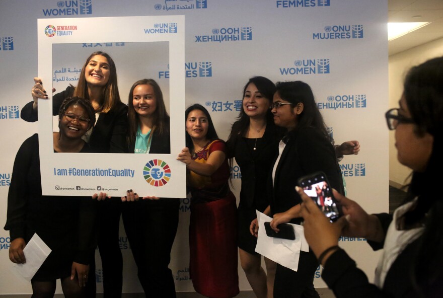A lighter moment on a serious day: the presentation of a Global Girls' Bill of Rights at the U.N. Left to right: Six of the young women who helped draft the document: Faith Nwando, 17; Djellza Pulatani, 17; Olivia Lombardo, 16; Angelica Morales, 21; Kanchan Amatya, 22; and Vishakha Agrawal, 20.