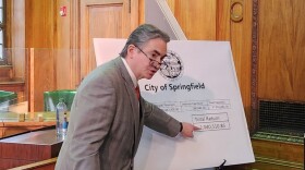 Springfield Mayor Domenic Sarno explains his administration's plan to use investment returns to offset property taxes next year.