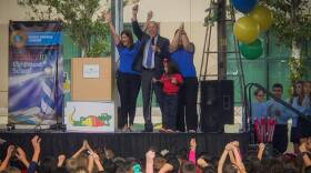 Charter Schools USA CEO Jonathan Hage, center, celebrates an academic recognition for Bonita Springs Charter School in Bonita Springs, Fla. in February 2017.