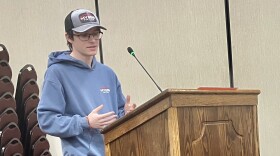 Lucas Myers, owner of Myers Tinting, talks to the Washington City Council on Monday before it voted on his commercial building and property improvement grant request.
