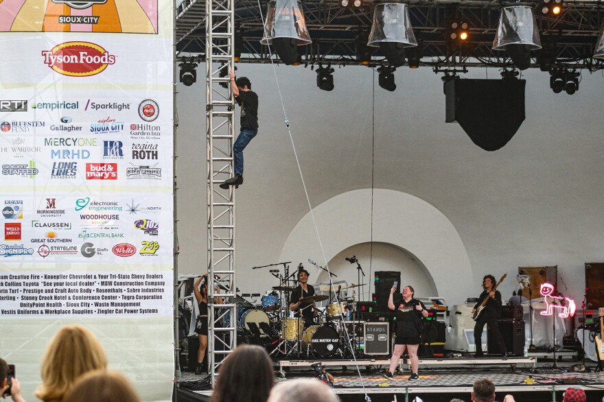 s. Holden Jaffe, the lead singer of Del Water Gap, ended the band's set by climbing the stage's industrial framing.