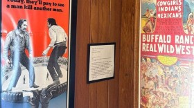 Two of the posters included in the "Ragged Old Flag" exhibit at the Johnny Cash Boyhood Home.