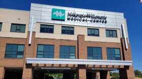 A hospital building. A sign says "McKenzie-Willamette Medical Center."