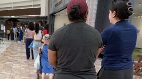 People in El Paso line up at an early voting polling place to cast their ballots in the midterm elections.