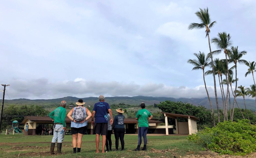 KUA staff pose in front of Uncle Mac's farm on Molokaʻi on Feb. 3, 2023.