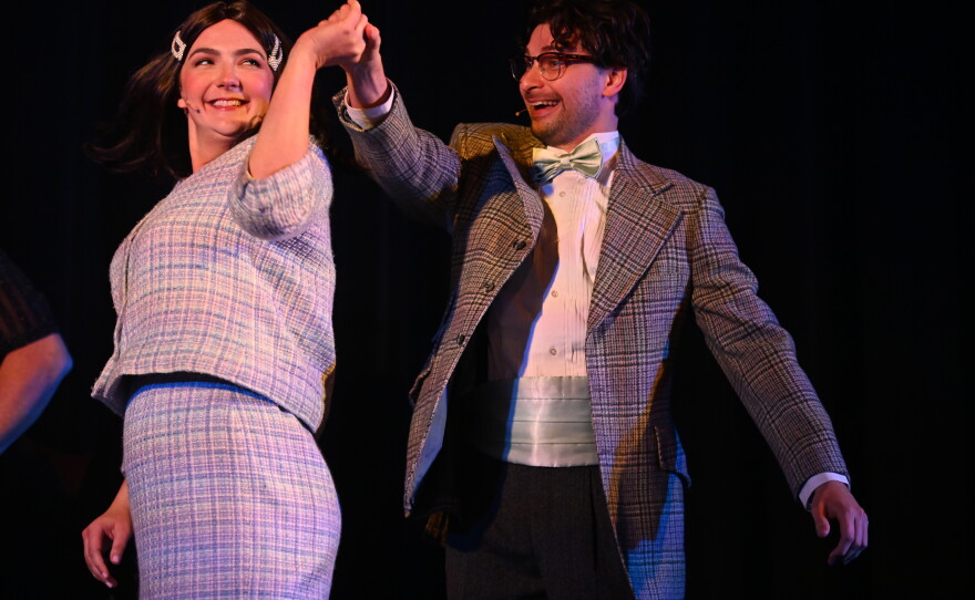 Camille Reinecke and Joshua Plesce who play characters Janet Weiss and Brad Majors perform a musical number during a dress rehearsal.