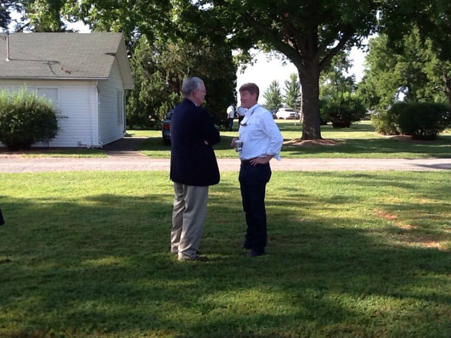 Missouri Gov. Jay Nixon, left, speaks with Attorney General Chris Koster earlier this month at the Missouri State Fair. Nixon criticized Koster for a statement the Democratic gubernatorial nominee made about school funding.