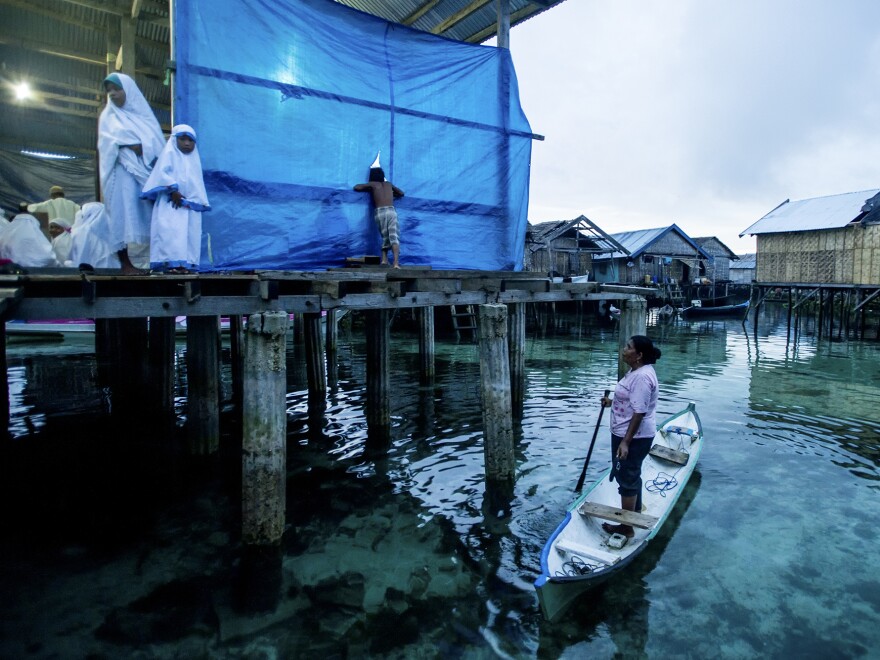 Many of the Bajau now live in houses perched on stilts, but they hold a deep reverence for the ocean and the spirits that they believe inhabit the waters.