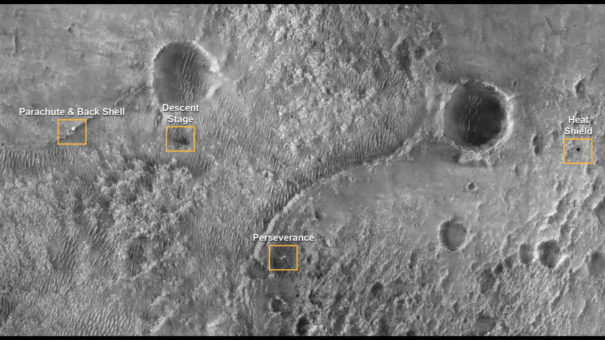 In this photograph taken by the Mars Reconnaissance Orbiter the various components of the Mars mission are seen on the planet's surface following landing.