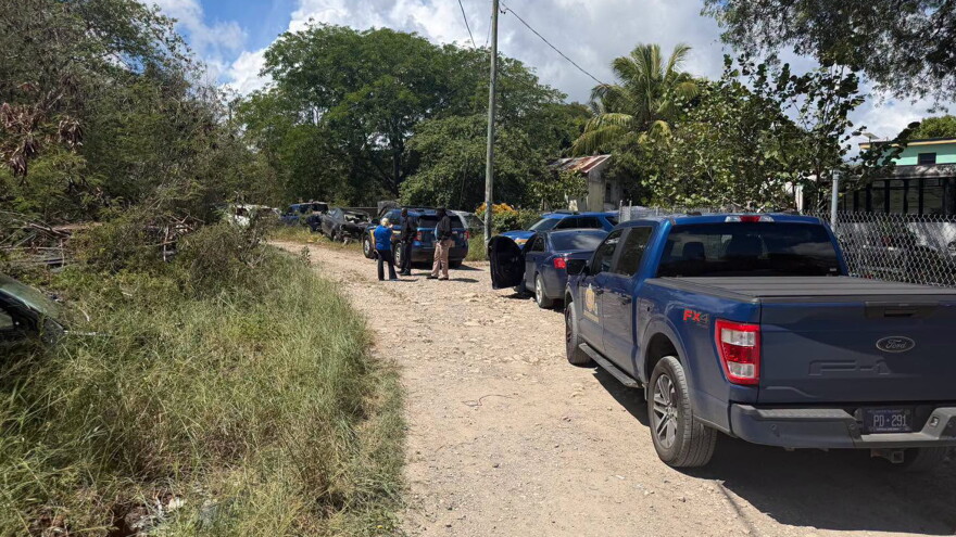 Pictured: VIPD personnel along a dirt road in the Old Fredensborg community on St. Croix, where authorities began their investigation into the fatal shooting of 24-year-old Jahmarie Warden on Tuesday, October 20, 2026.