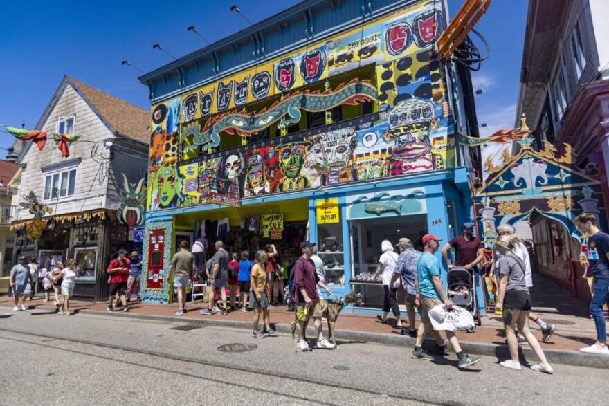 Tourists walk along Commercial Street in Provincetown in 2022. (Jesse Costa/WBUR)