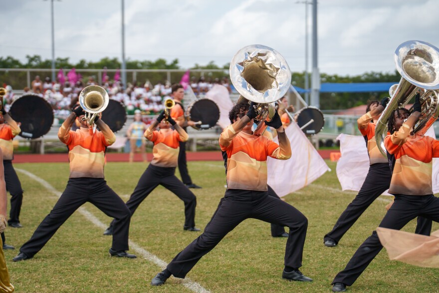 Students from Charles W. Flanagan High School's marching band, The Falcon Sound, perform in 2025.