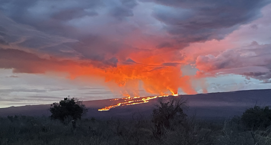 Photo taken on Nov. 29, 2022 shows lava flows moving northeast, downslope of Mauna Loa volcano from the Northeast Rift Zone eruption.